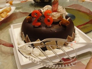 I celebrated my 26th birthday with some relatives and the cake came with a cute cutter.  The candles originally said 28 because they thought they'd get 28 candles to use, but we fixed it!