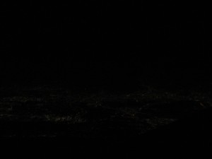The captain brought our attention to the lights of Seoul, South Korea, and the blackness beyond that is North Korea.