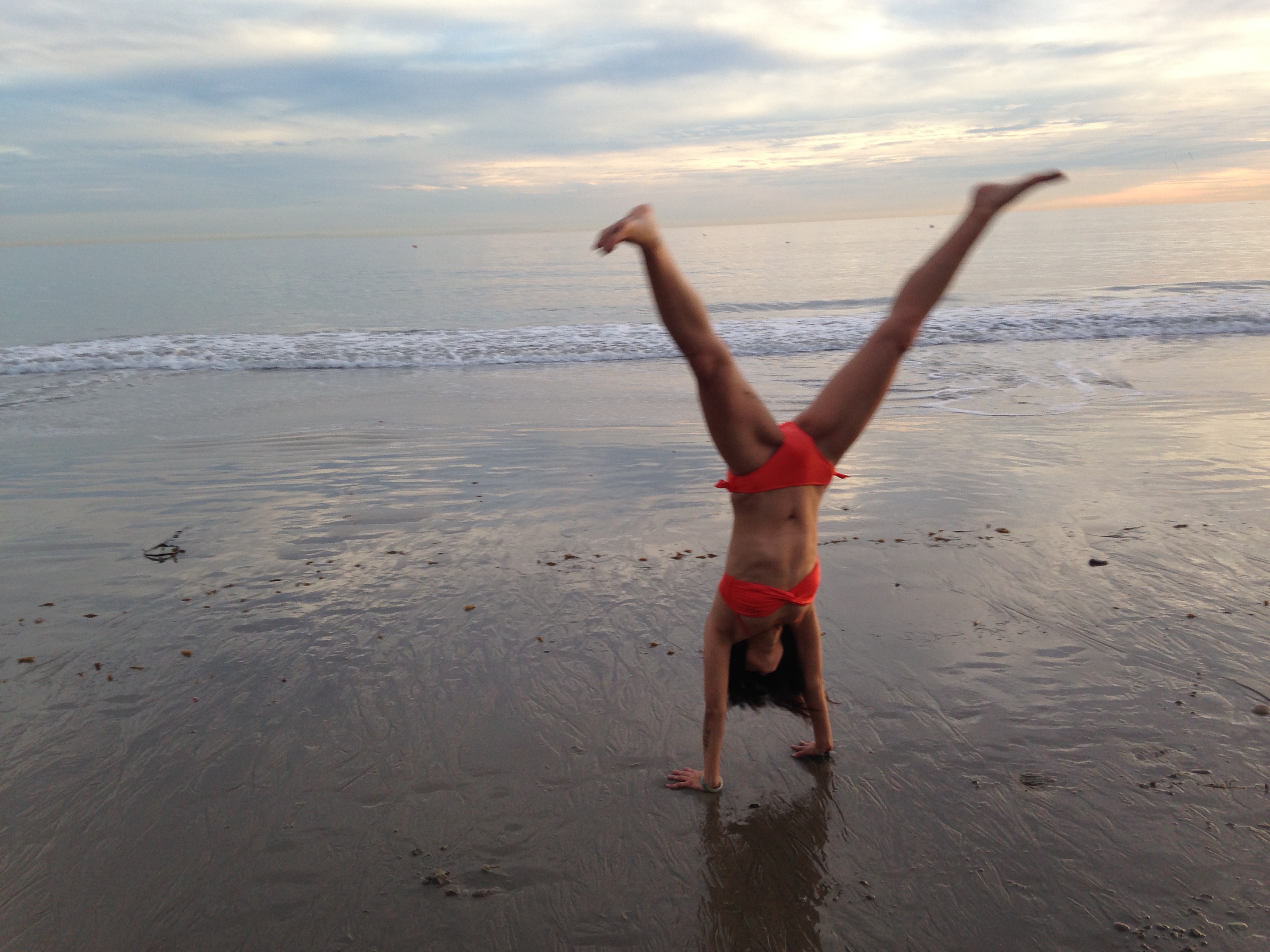 up-in-handstand-portion-of-cartwheel-at-