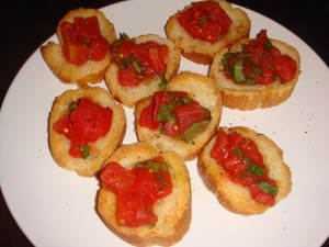 Bruschetta with rubbed garlic and fresh tomatoes.