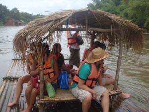 bamboo raft with capacity for ten floating down river in thailand