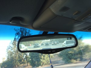 A shocker in the mirror: fleet of cop cars.  Rather intimidating.