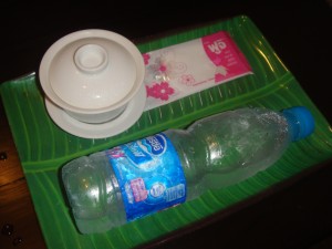 tray with cup of tea, bottle of water, and hand wipe at let's relax spa in phuket thailand