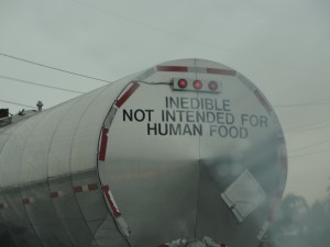 truck with message on back warning of inedible contents