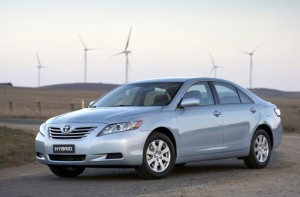 toyota camry hybrid model with wind generators in background