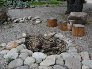 fire pit with log seats