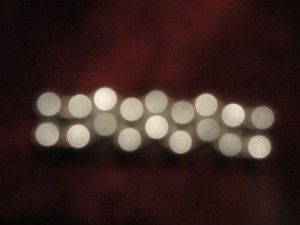 blurred dots of light reflecting off buckyballs