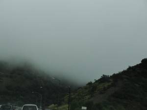 heavy fog hides what is behind the hills