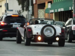 closeup of old school car driving in westwood