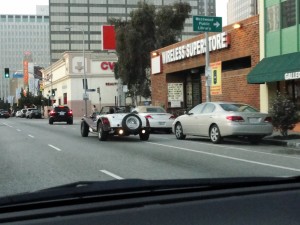 old school car driving in westwood