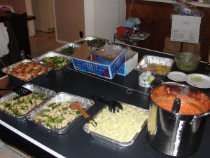 a lovely display of home-cooked dishes for a gathering