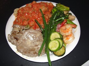 a plate of food from home-cooked buffet