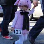 little girl in pig costume for haute dog parade 2010