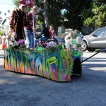 dogs on colorful float for haute dog parade 2010