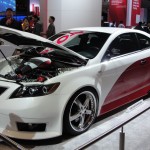 toyota with white in front and on top, red on bottom and back