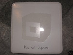 sticker decal with square logo and text "pay with square" to place in view of customers