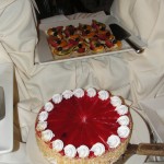 plate of fruit tarts and cake