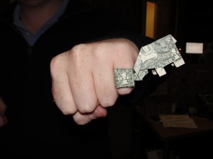 dollar bills folded into ring and elephant
