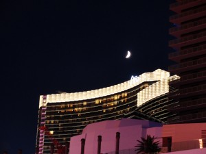 crescent moon shines over the newly-built aria on the vegas strip