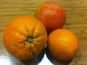 orange, grapefruit, and over-sized orange