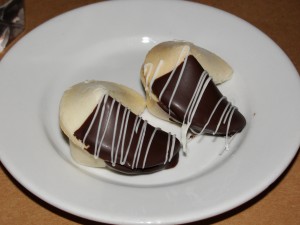 two chocolate-covered fortune cookies