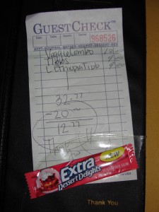receipt from little ethiopia with cheap price and gum for dessert