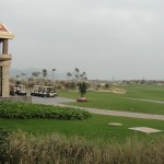 view of shenzhou peninsula golf course, clubhouse, and golf carts