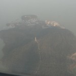 a view of a tall temple from airplane flying overhead