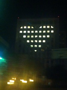 lights in windows of hospital lit up into heart shape