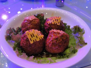 huge meatballs topped with "double happiness" symbol