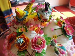 wedding bun or wedding bao made completely of bread molded into dragon, phoenix, fish, and flowers