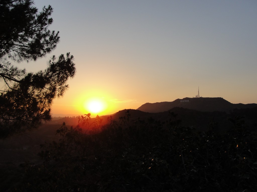 view of sunset from griffith observatory with hollywood sign just visible on the right