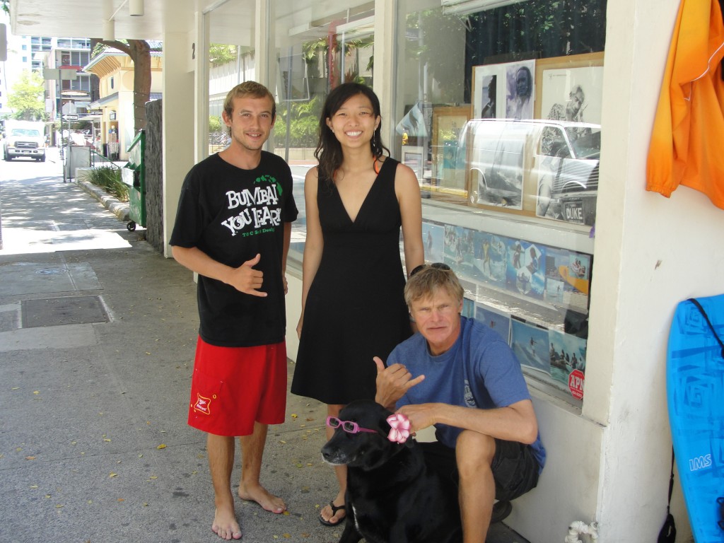 dcx surf school instructor erik, photographer ray, and dog malu