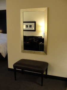 wall mirror and padded bench at w hotel silicon valley