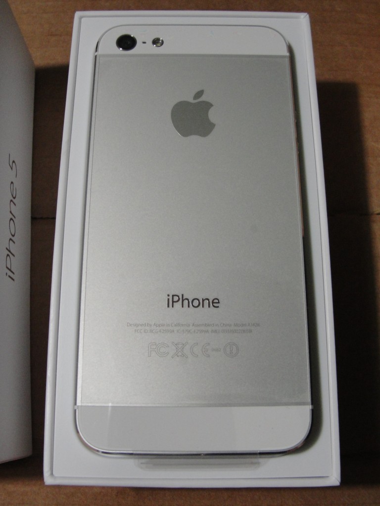 back of white & silver iphone 5 in box