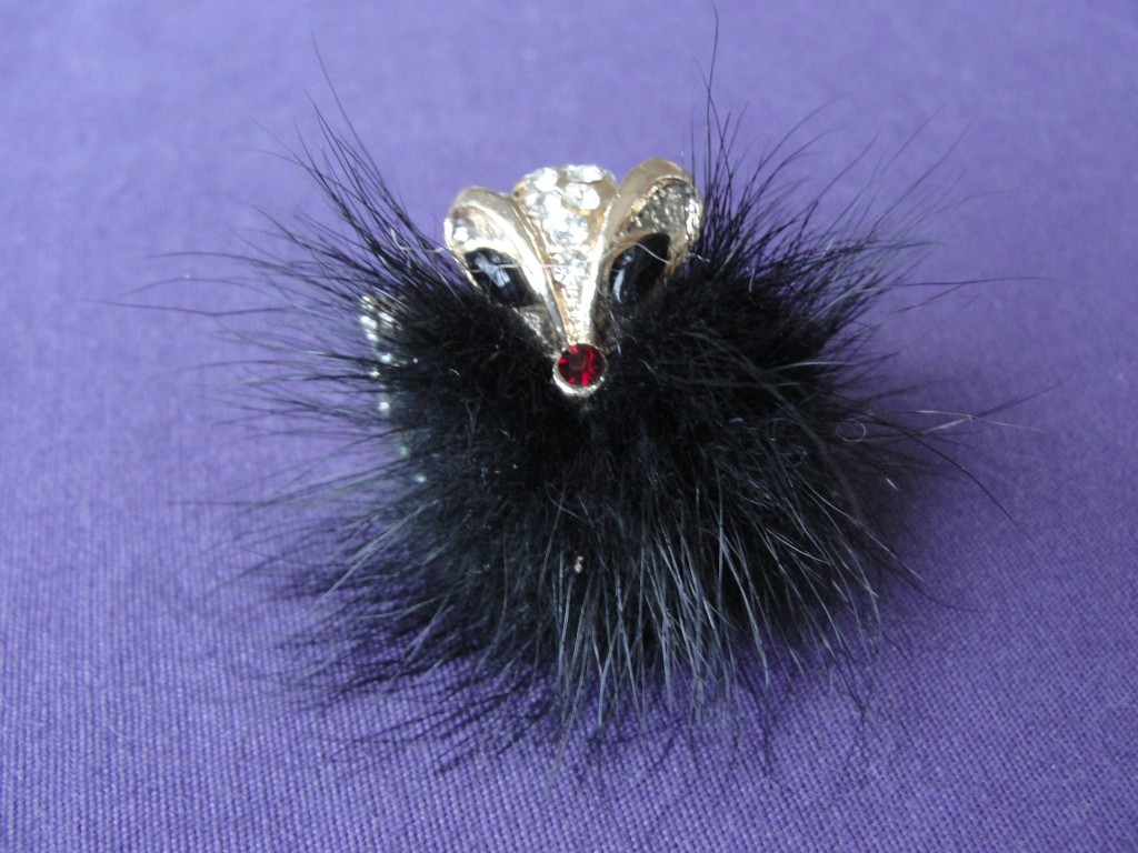 fuzzy black fox ring with gems