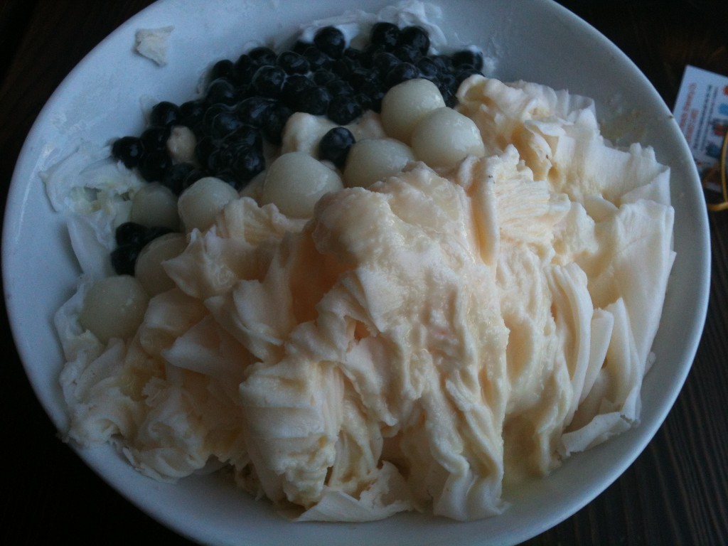 cantaloupe snow cream with boba, rice cakes, and condensed milk drizzle from blockheads shavery