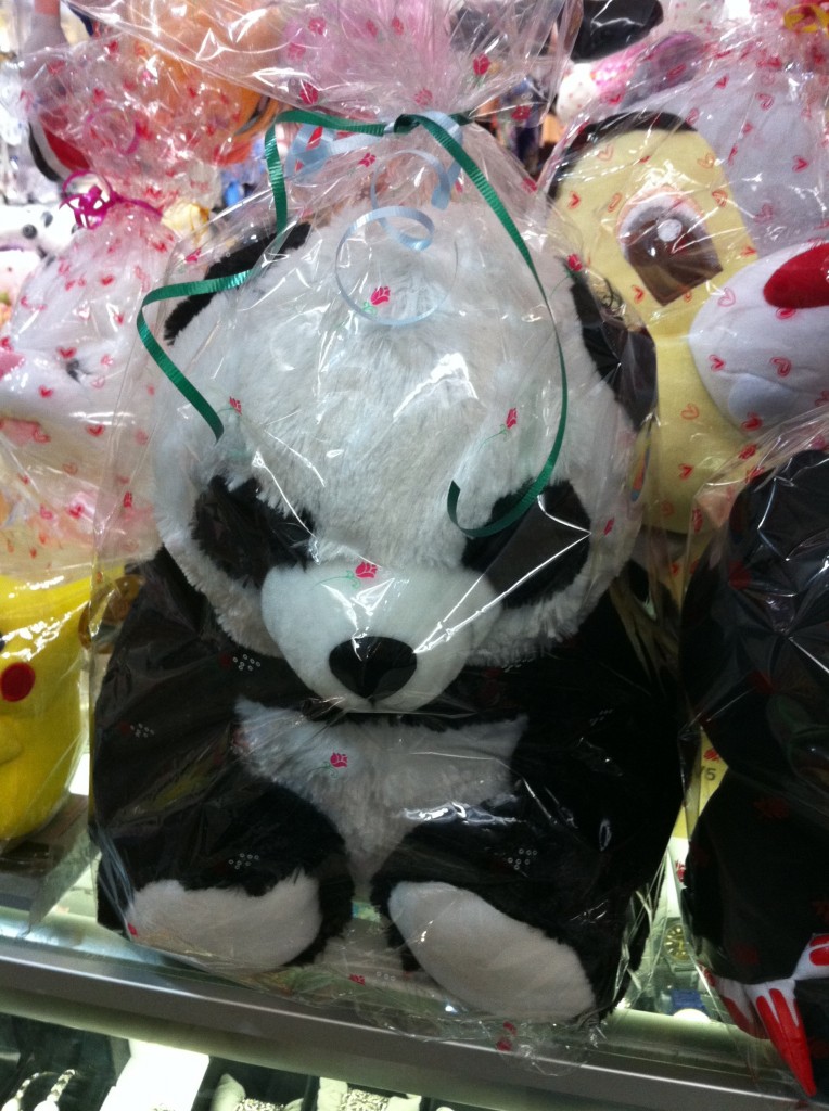 panda stuffed animal toy in gift wrap