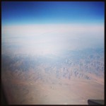 view of mountains and landscape in midwest united states from airplane
