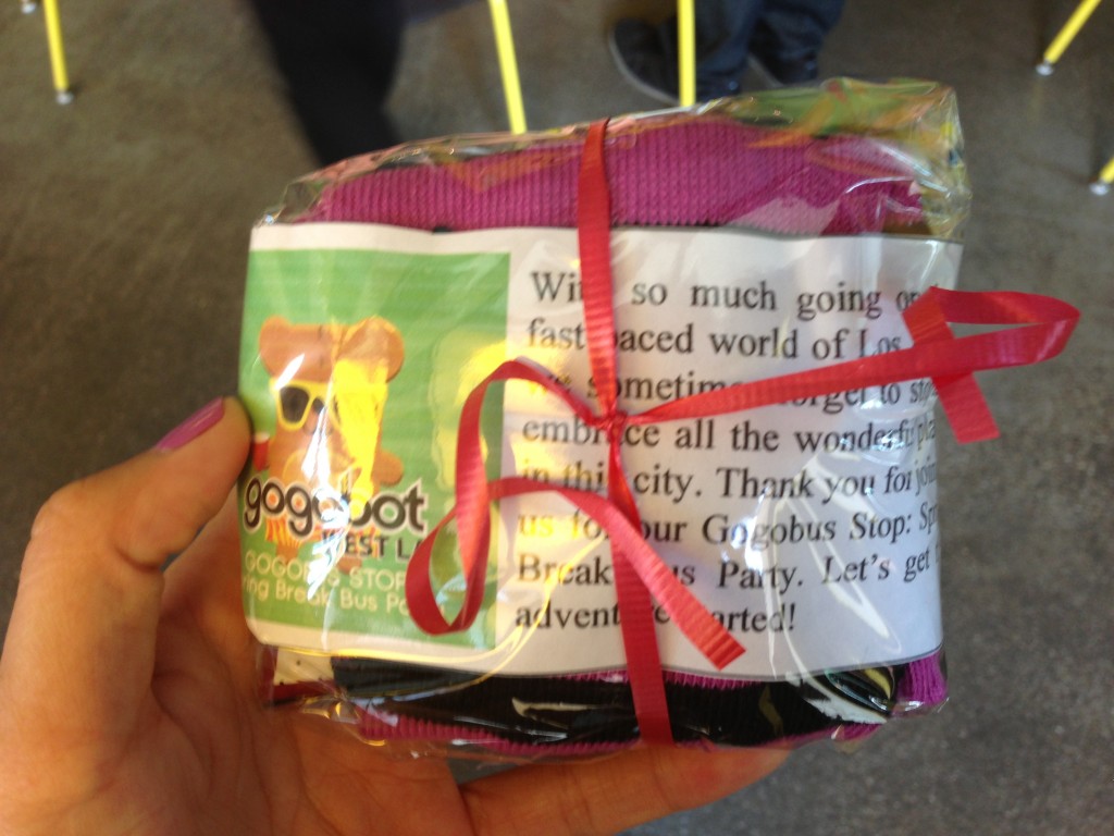 bag of gogobot goodies with leggings, snap-on wrist band, and friendship bracelet