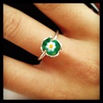 cute tous ring with bear wrapped around green and white flower murano crystal