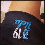 view of ucla bruins basketball shorts from first person perspective (upside down)