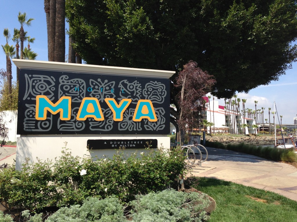 sign for the hotel maya a doubletree by hilton in long beach