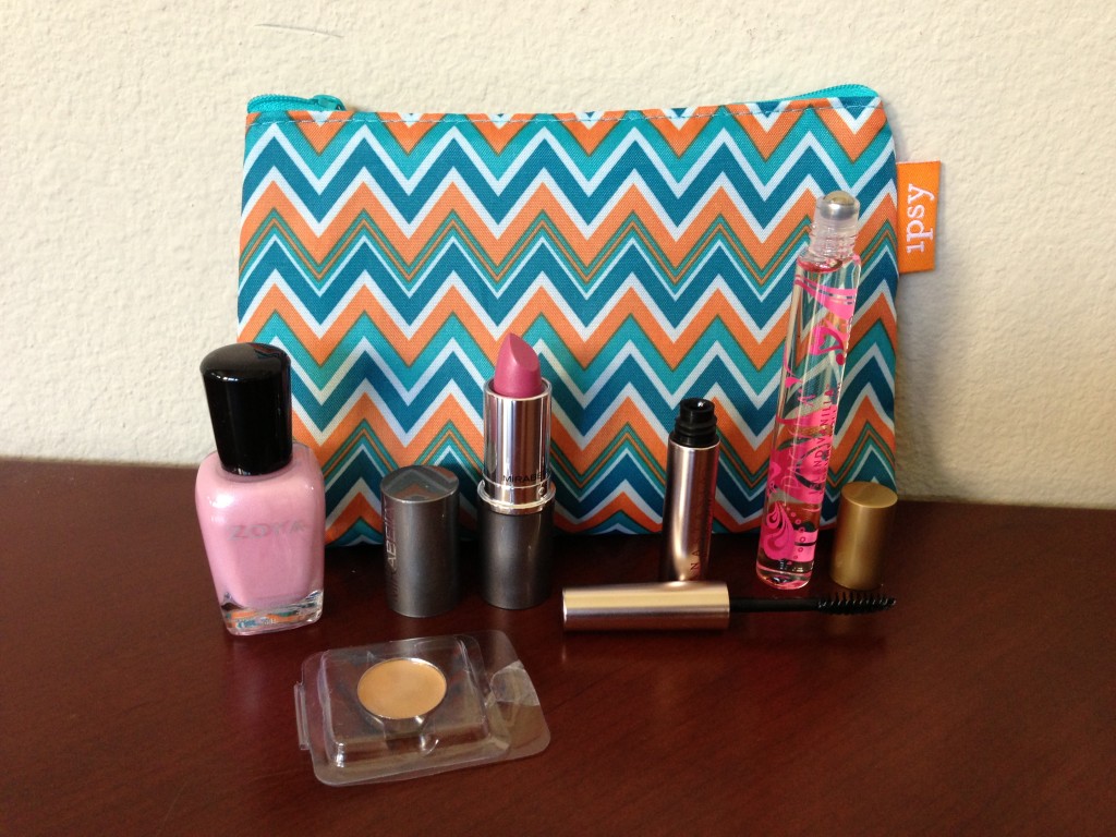 ipsy may 2013 bag items including zoya gie gie nail polish, yaby honey concealer, mirabella daydream lipstick, anastasia clear eyebrow gel, and pacifiica island vanilla perfume roller