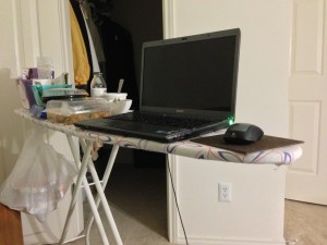 ironing board being used as desk