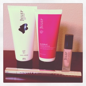 set of julep hand products including spf 30 hand lotion, glycolic hand scrub, oxygen nail treatment, and cuticle treatment