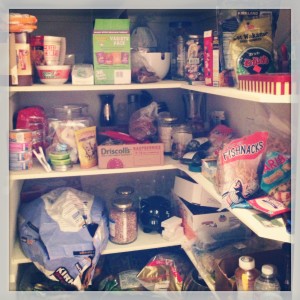 pantry shelves filled with random food items