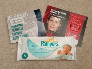 sample of pad, l'oreal revitalift miracle blur, and pampers sensitive wipes