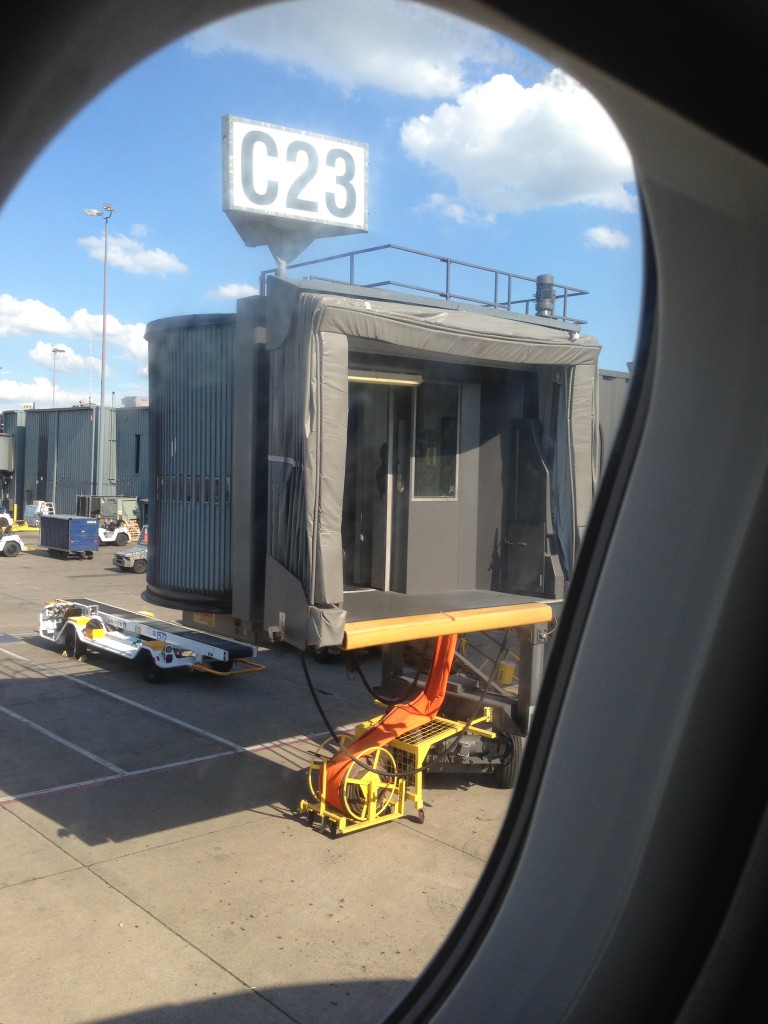 jetway outside airplane viewed from window of plane