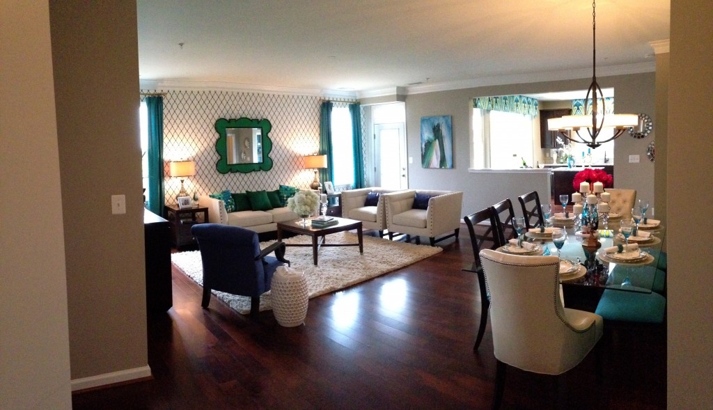 panoramic of living and dining room area of model home